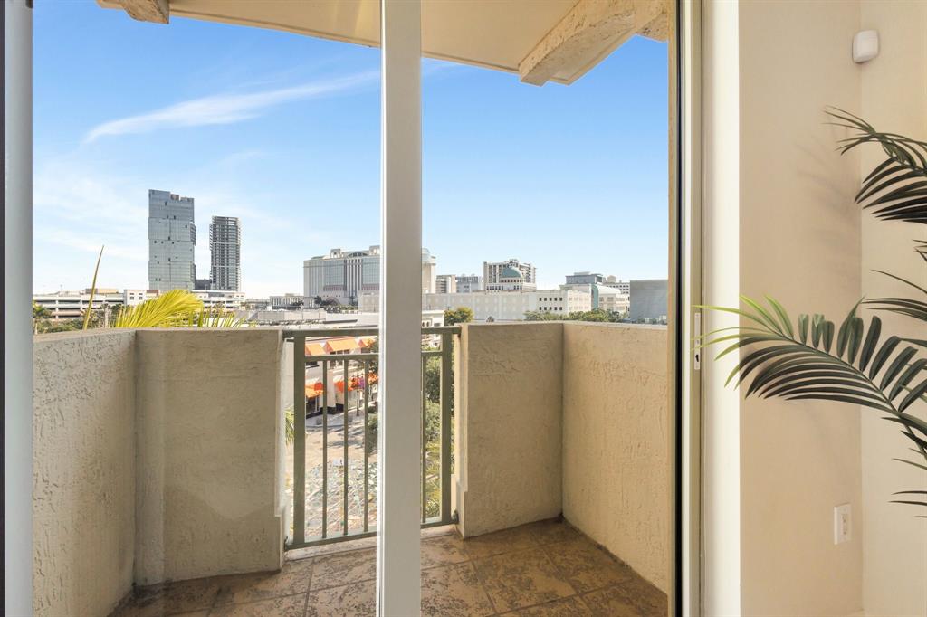 610 Clematis Street, Unit 412 West Palm Beach, FL 33401 - Photo 26 of 52 a view of a living room with a floor to ceiling window