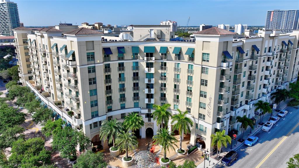 610 Clematis Street, Unit 412 West Palm Beach, FL 33401 - Photo 52 of 52 a view of a building with a garden