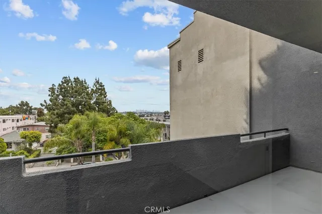 a view of a balcony with an outdoor space
