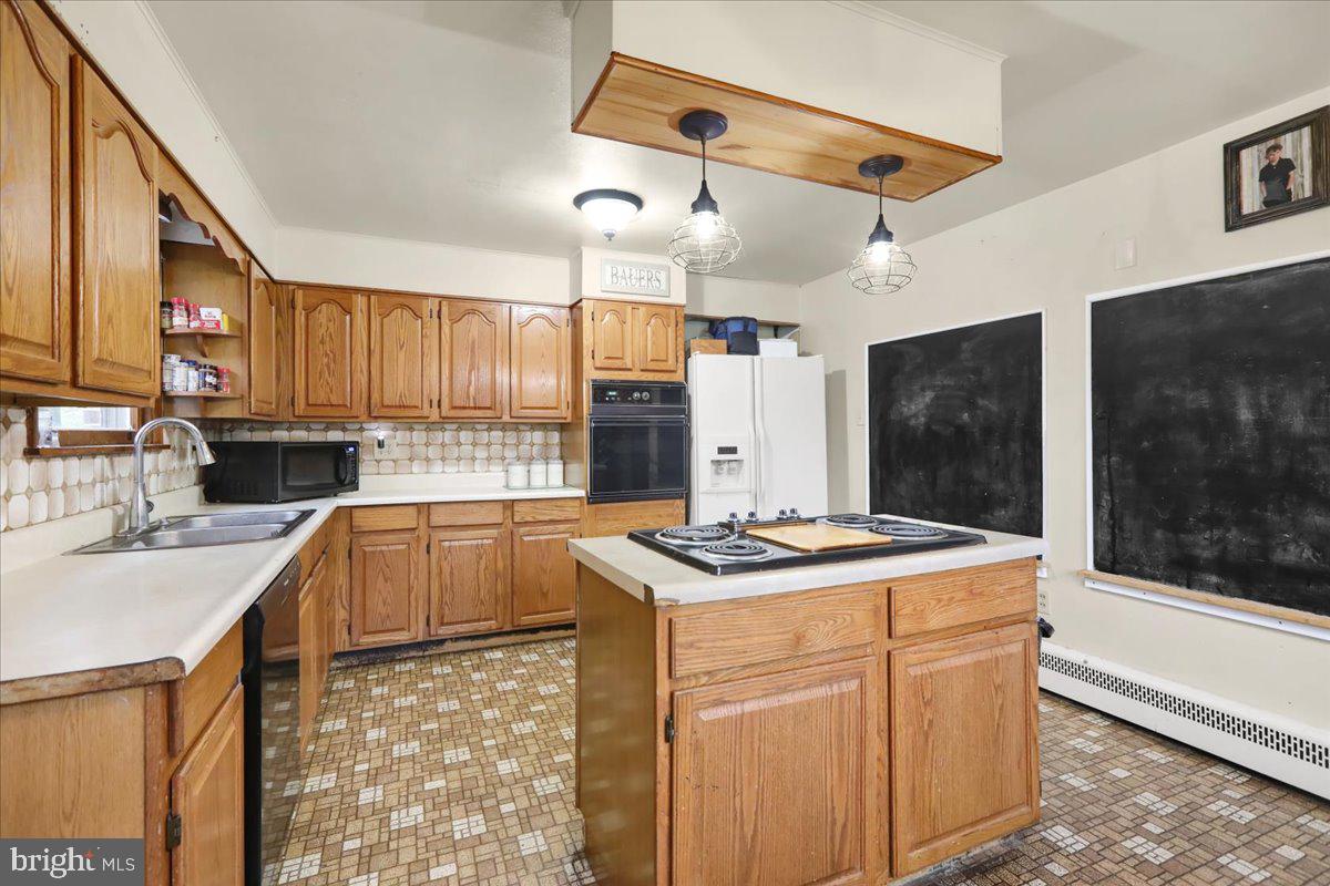 1135 Elverson Road Morgantown, PA 19543 - Photo 4 of 26 Kitchen from side entry