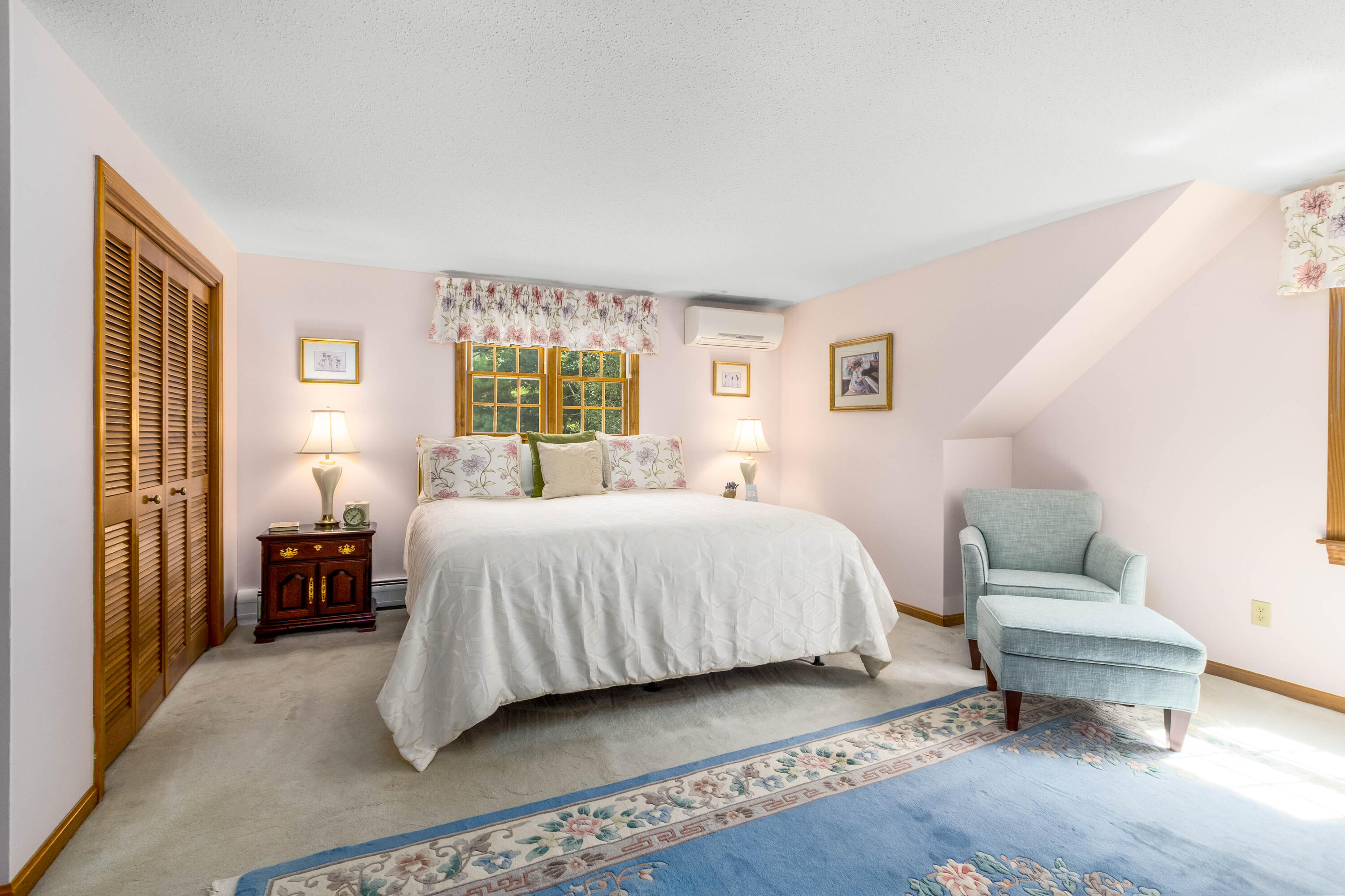 110 Marble Road Barnstable, MA 02630 - Photo 19 of 33 a spacious bedroom with a bed and a couch