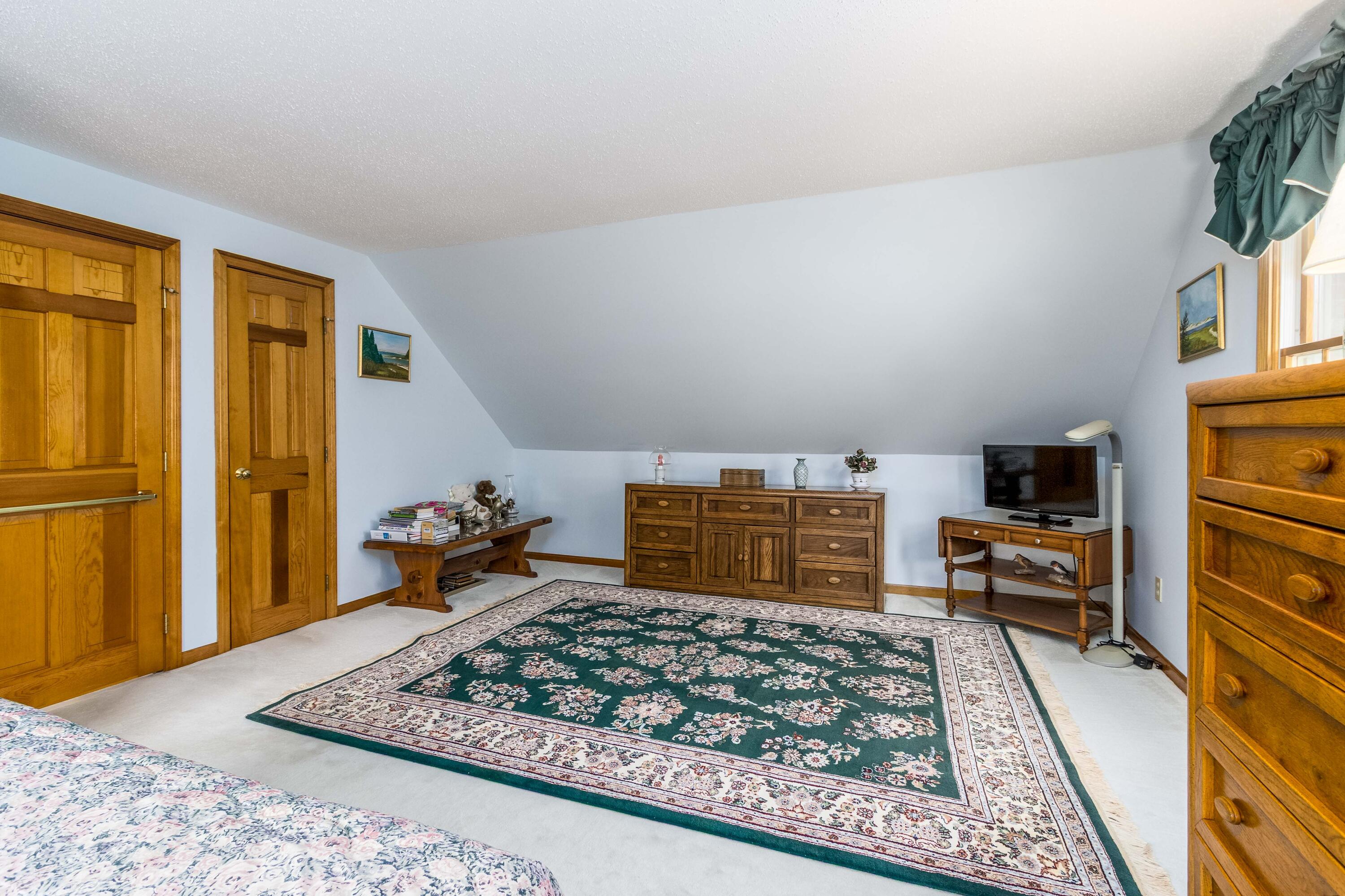 110 Marble Road Barnstable, MA 02630 - Photo 22 of 33 a room with furniture and a rug
