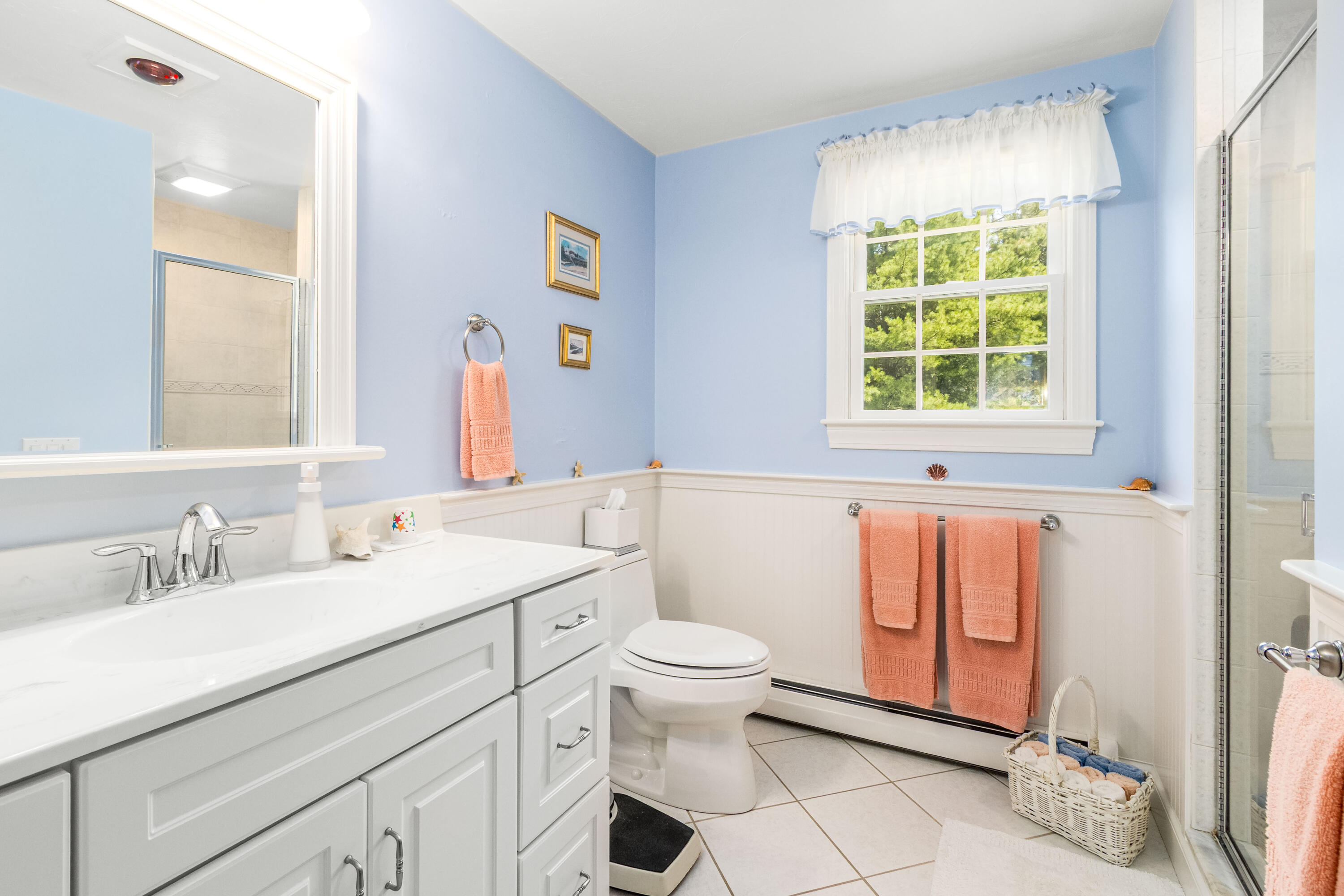 110 Marble Road Barnstable, MA 02630 - Photo 23 of 33 a bathroom with a sink toilet vanity and window