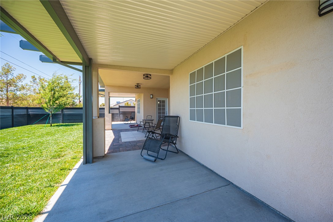 441 Belville Road Pahrump, NV 89048 - Photo 38 of 44 A spacious covered patio provides a delightful outdoor living extension to this charming residence.