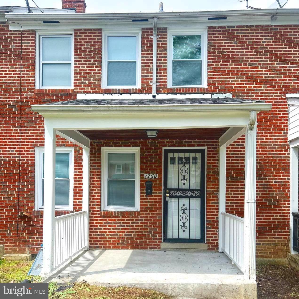 1260 Cedarcroft Road Baltimore, MD 21239 - Photo 1 of 18 a front view of a house