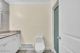 204 Covered Bridge Boulevard, Unit D Manalapan, NJ 07726 - Photo 11 of 20 a bathroom with a toilet a sink and mirror