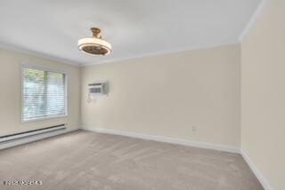 204 Covered Bridge Boulevard, Unit D Manalapan, NJ 07726 - Photo 13 of 20 an empty room with a window
