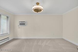 204 Covered Bridge Boulevard, Unit D Manalapan, NJ 07726 - Photo 14 of 20 an empty room with a window