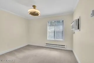 an empty room with a empty space and windows