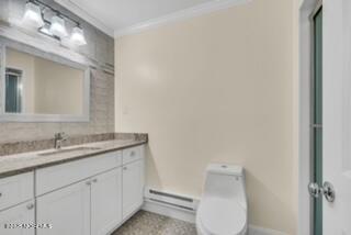 204 Covered Bridge Boulevard, Unit D Manalapan, NJ 07726 - Photo 10 of 20 a bathroom with a toilet sink and mirror