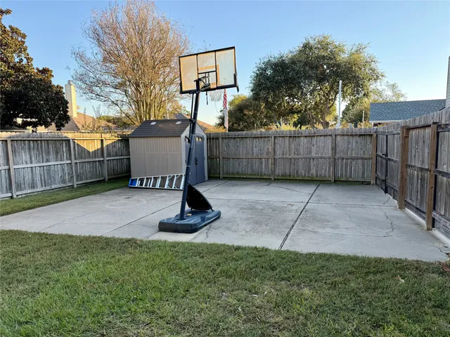 a view of a backyard with a garden