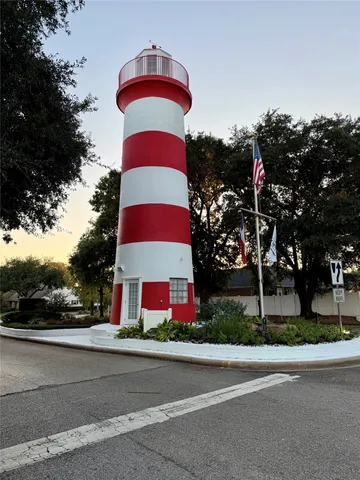 a multi story building with sign broad