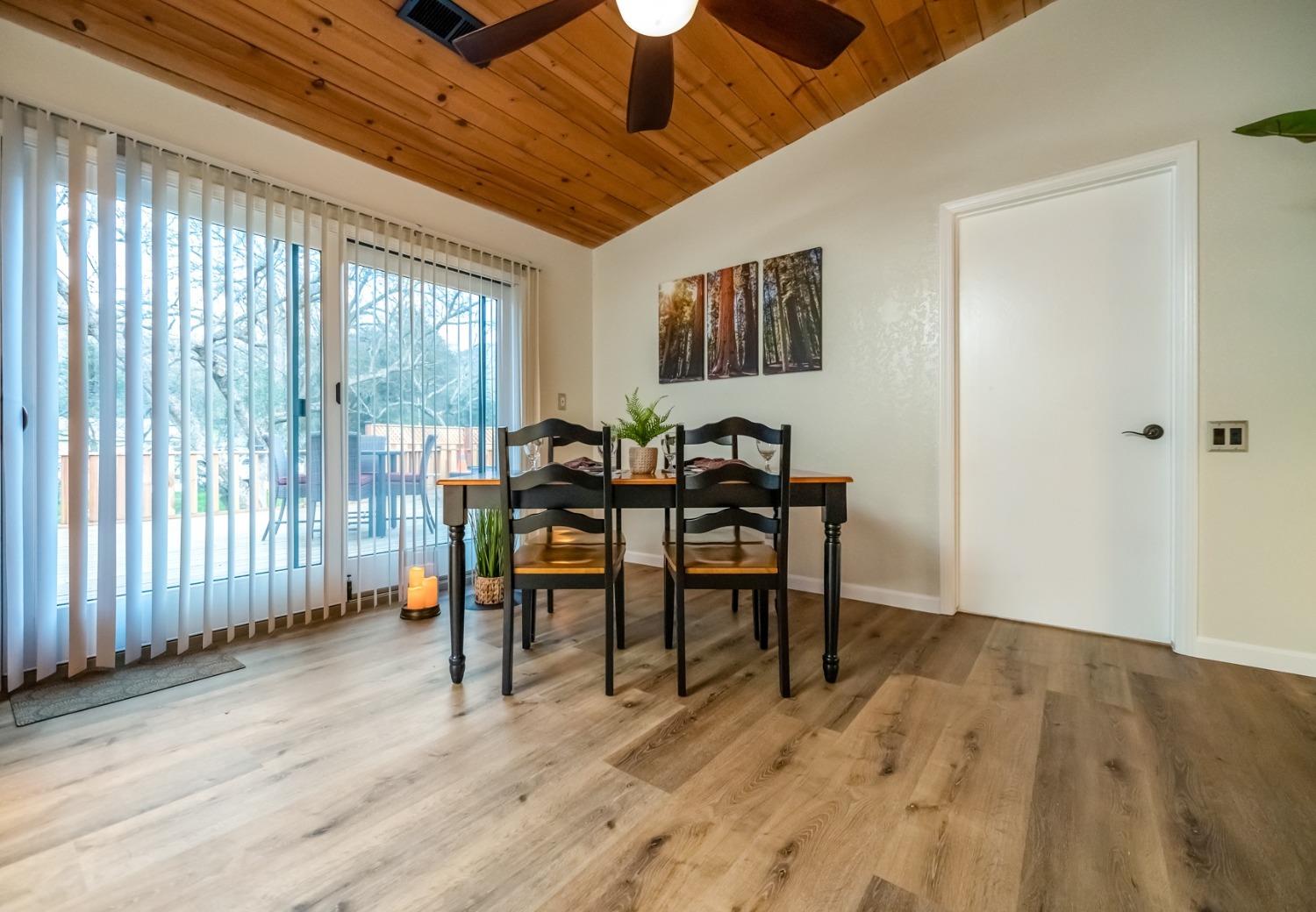40984 Grouse Drive Three Rivers, CA 93271 - Photo 13 of 49 a view of a dining room with furniture and wooden floor