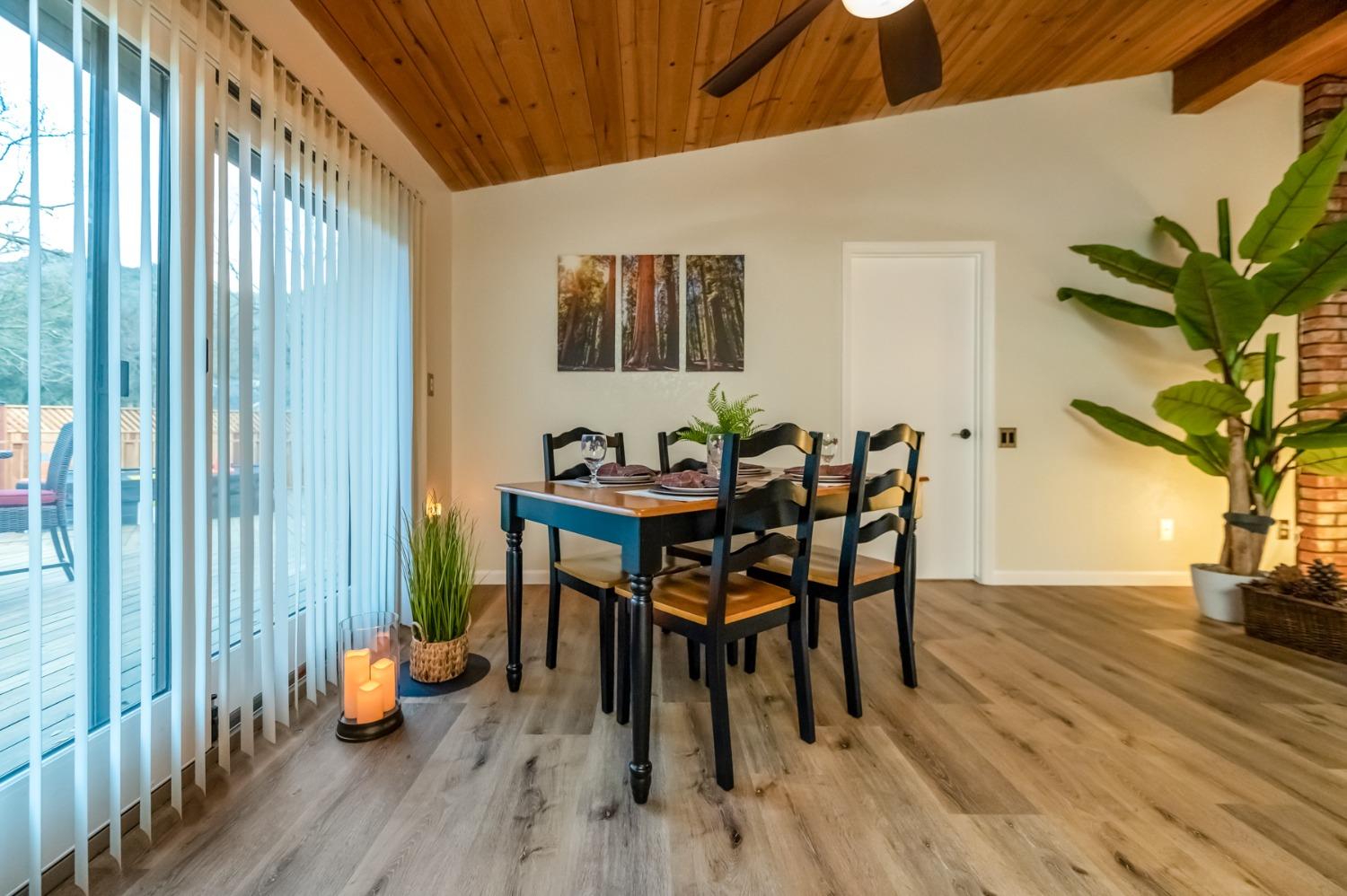 40984 Grouse Drive Three Rivers, CA 93271 - Photo 14 of 49 a dining room with furniture and wooden floor