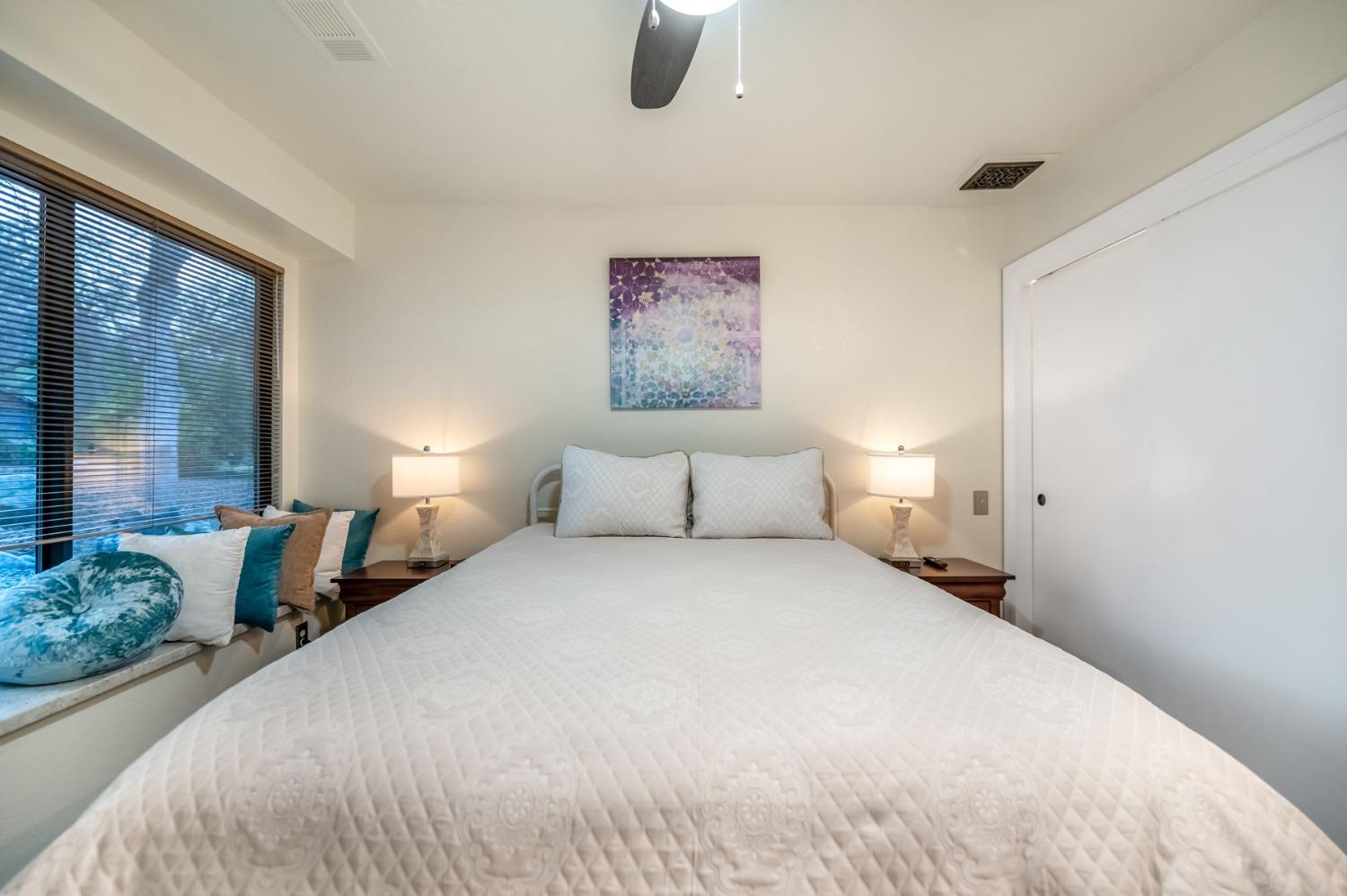 40984 Grouse Drive Three Rivers, CA 93271 - Photo 18 of 49 a bedroom with bed and large windows