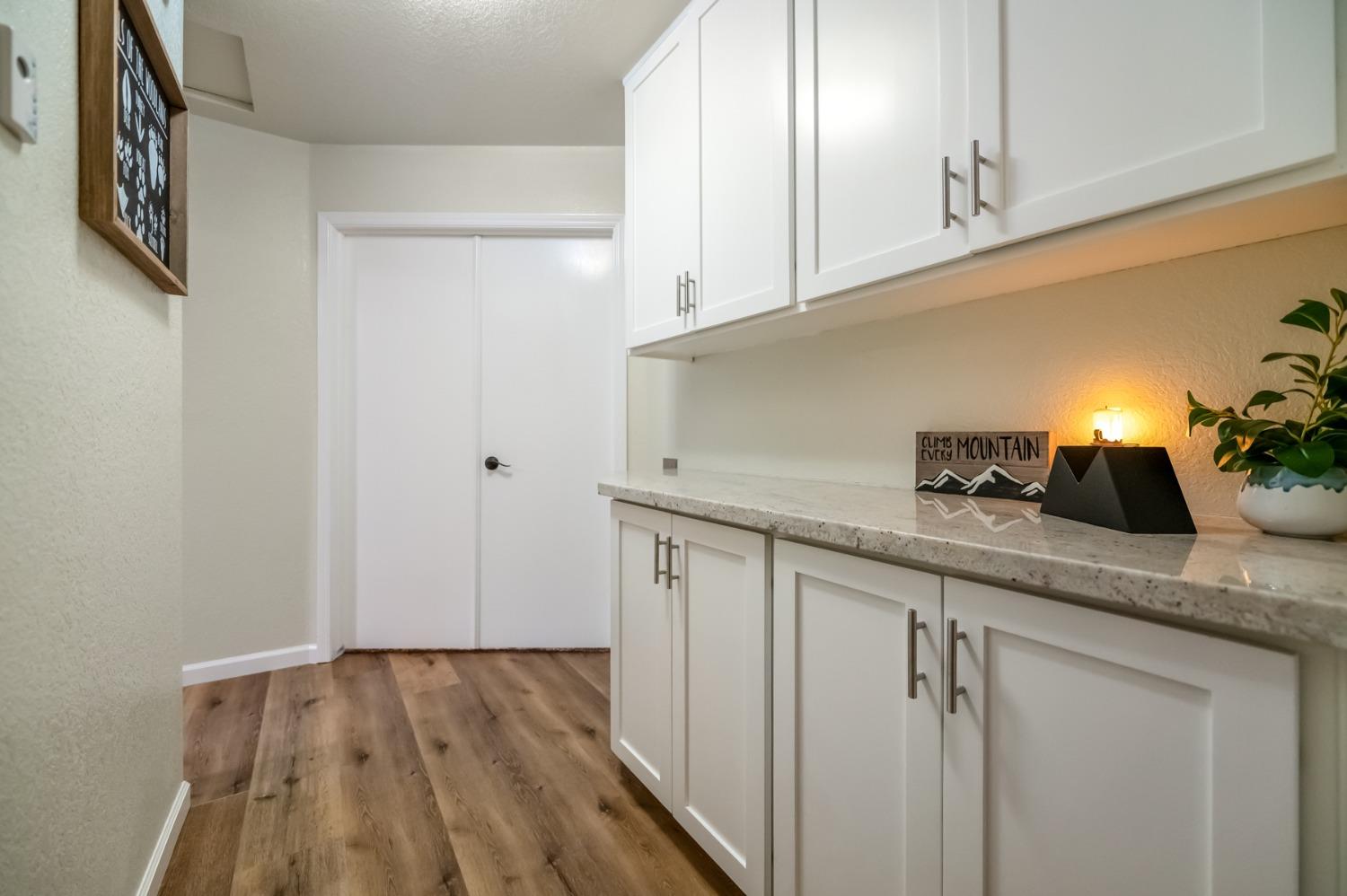 40984 Grouse Drive Three Rivers, CA 93271 - Photo 19 of 49 a kitchen with granite countertop a sink and cabinets
