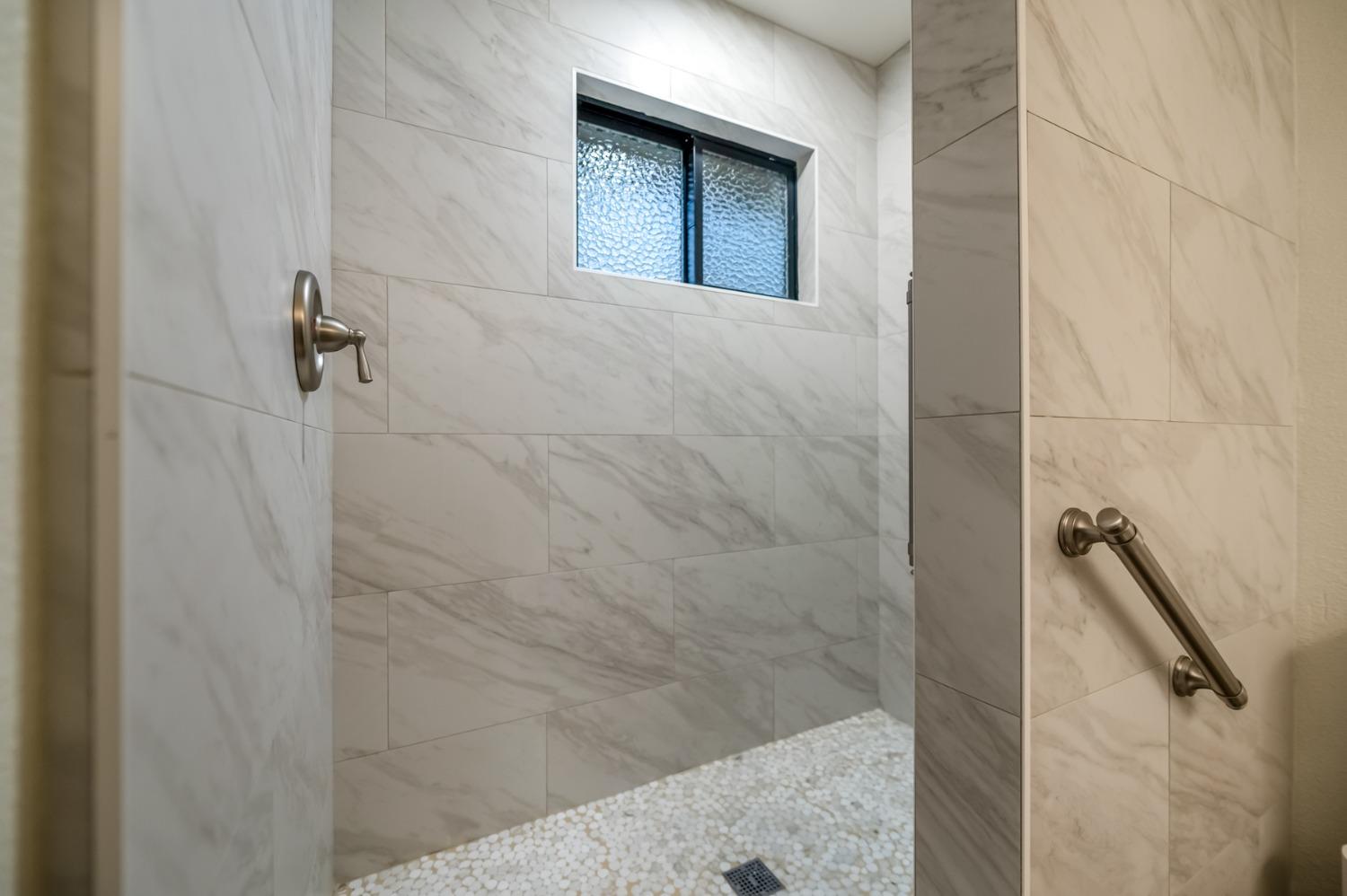 40984 Grouse Drive Three Rivers, CA 93271 - Photo 22 of 49 a bathroom with a shower