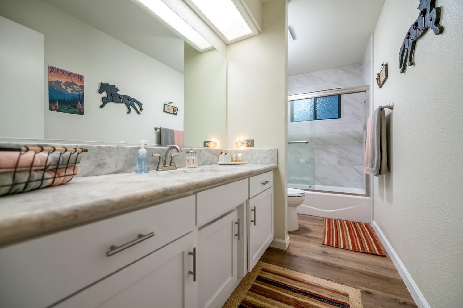 40984 Grouse Drive Three Rivers, CA 93271 - Photo 26 of 49 a bathroom with a sink and mirror