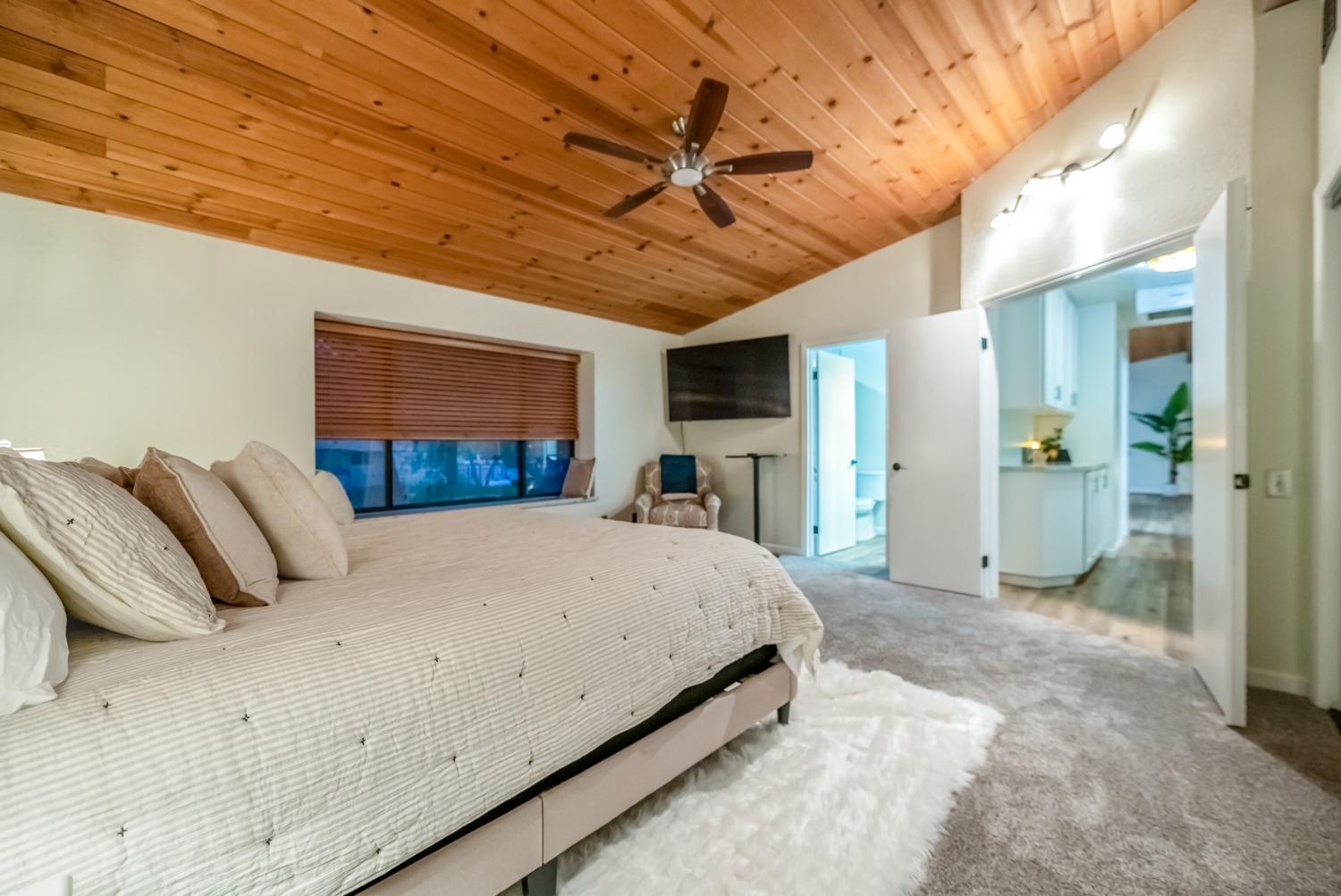 40984 Grouse Drive Three Rivers, CA 93271 - Photo 31 of 49 a bed room with a bed mirror and a desk