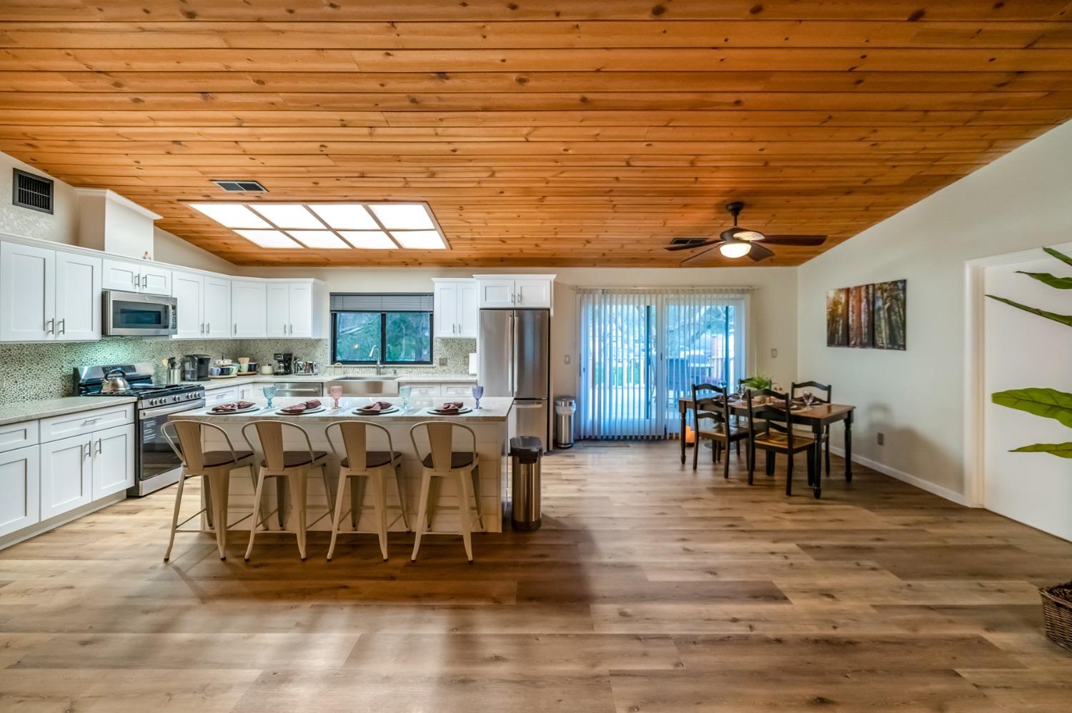40984 Grouse Drive Three Rivers, CA 93271 - Photo 8 of 49 a living room with lots of furniture and kitchen view