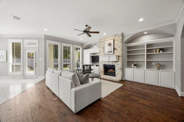 a kitchen that has a stove a sink and a refrigerator