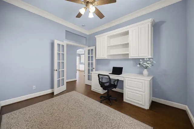 a bedroom with a bed window and a couch