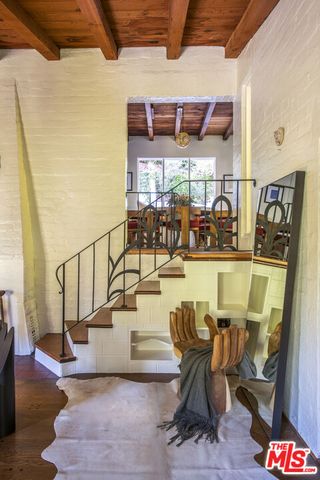 a living room with a rug