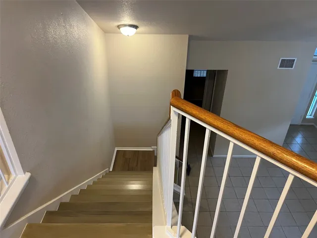 a view of a house with a trees from a window