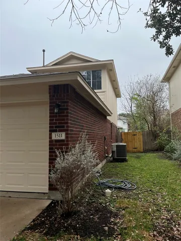 a kitchen with stainless steel appliances granite countertop a sink and a stove