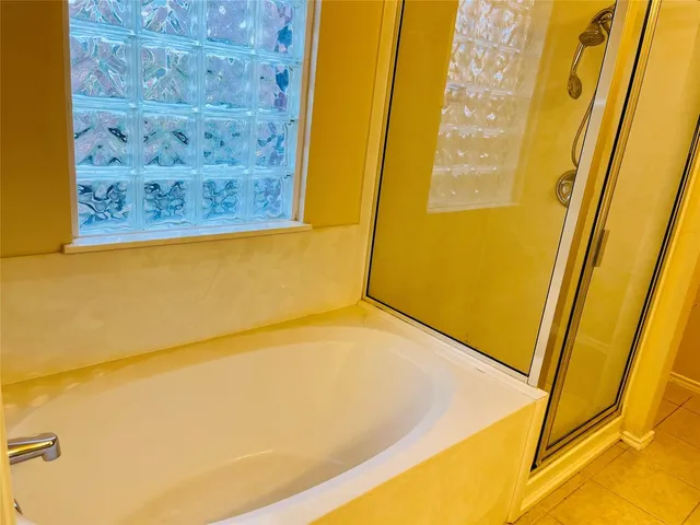 a view of a house with a tree