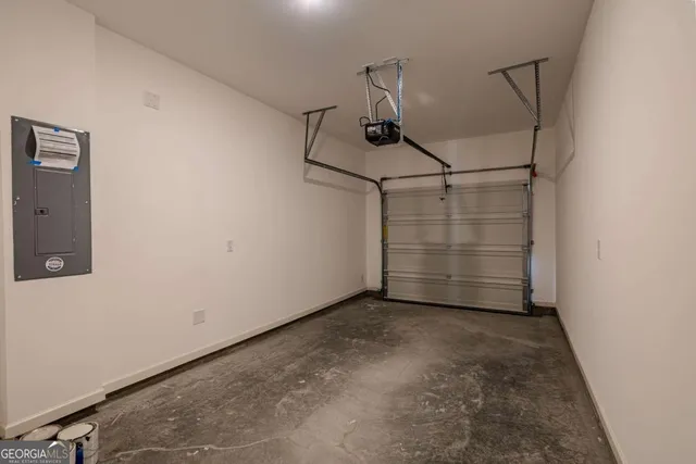 a view of storage and utility room with empty racks