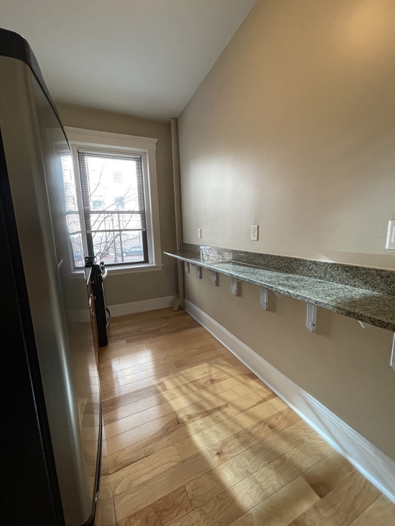 660 Huntington Avenue, Unit 14 Boston, MA 02115 - Photo 7 of 19 a view of an empty room and window