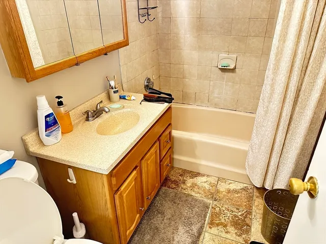 a bathroom with a sink and a bathtub
