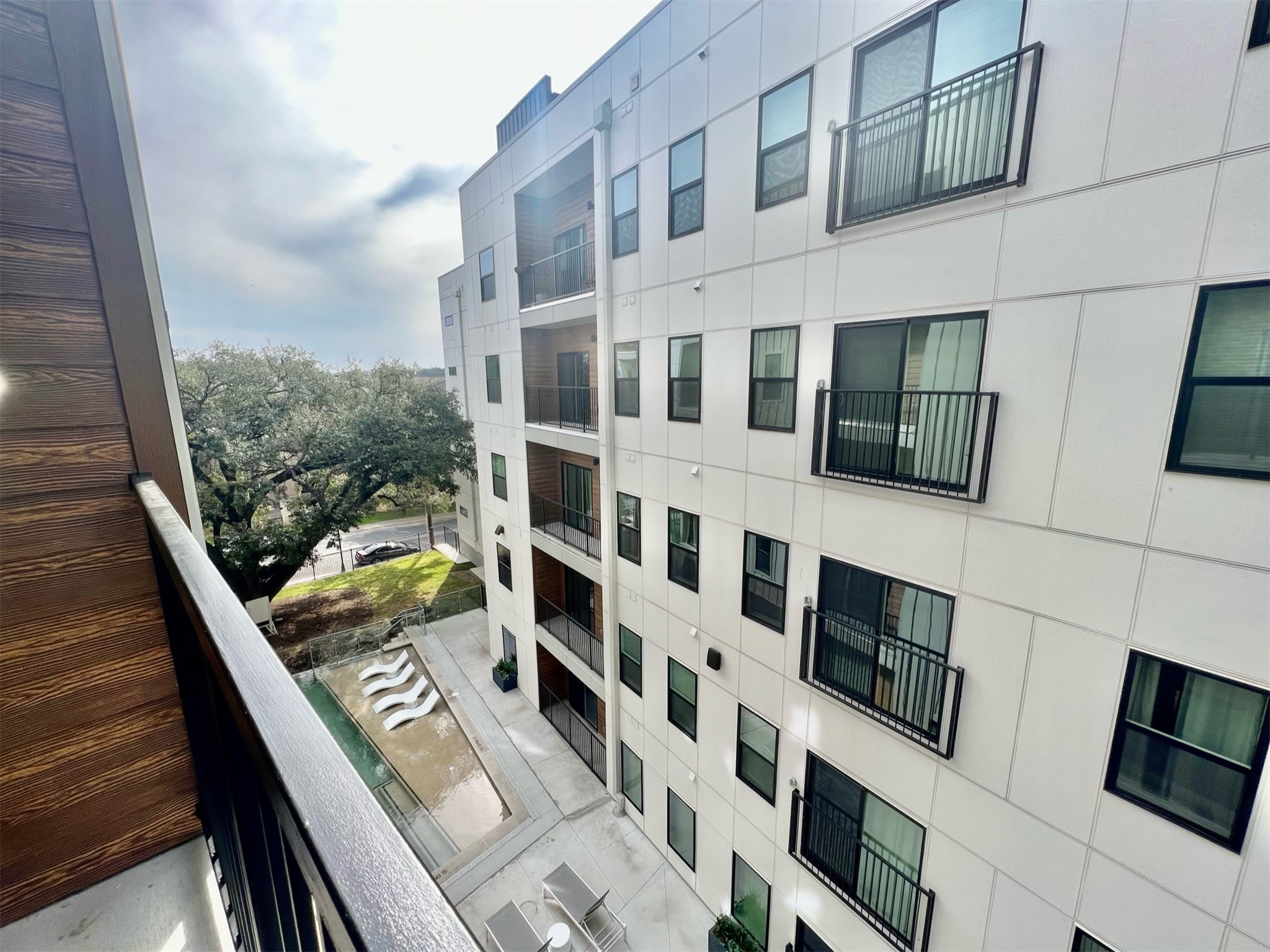 2500 Longview Street, Unit 417 Austin, TX 78705 - Photo 12 of 24 Balcony view to the pool