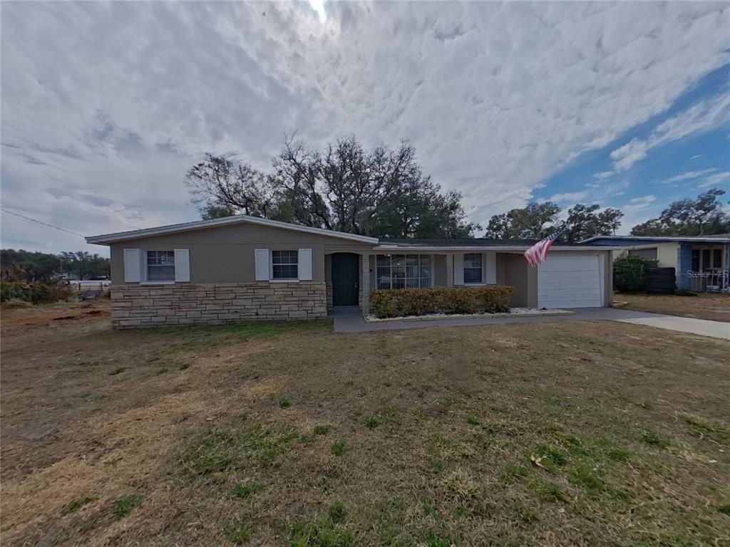 Undisclosed Address Seffner, FL 33584 - Photo 1 of 1 a view of a house with a yard