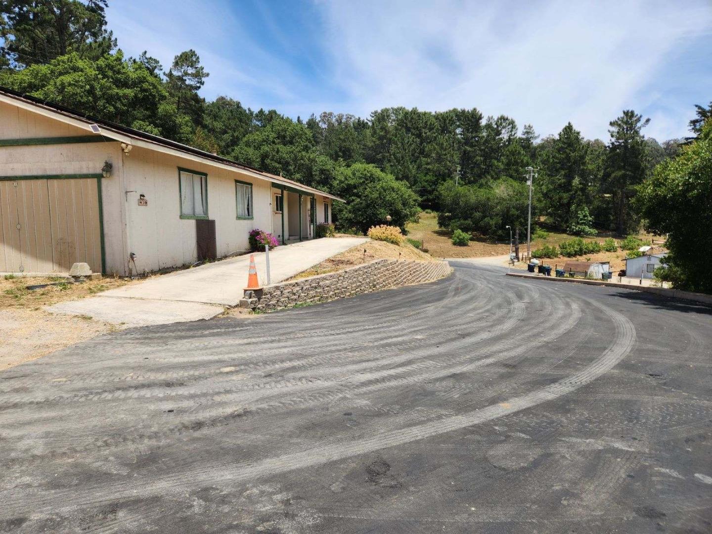 819 Lewis Road Watsonville, CA 95076 - Photo 1 of 32 a backyard of a house with trees and outdoor space