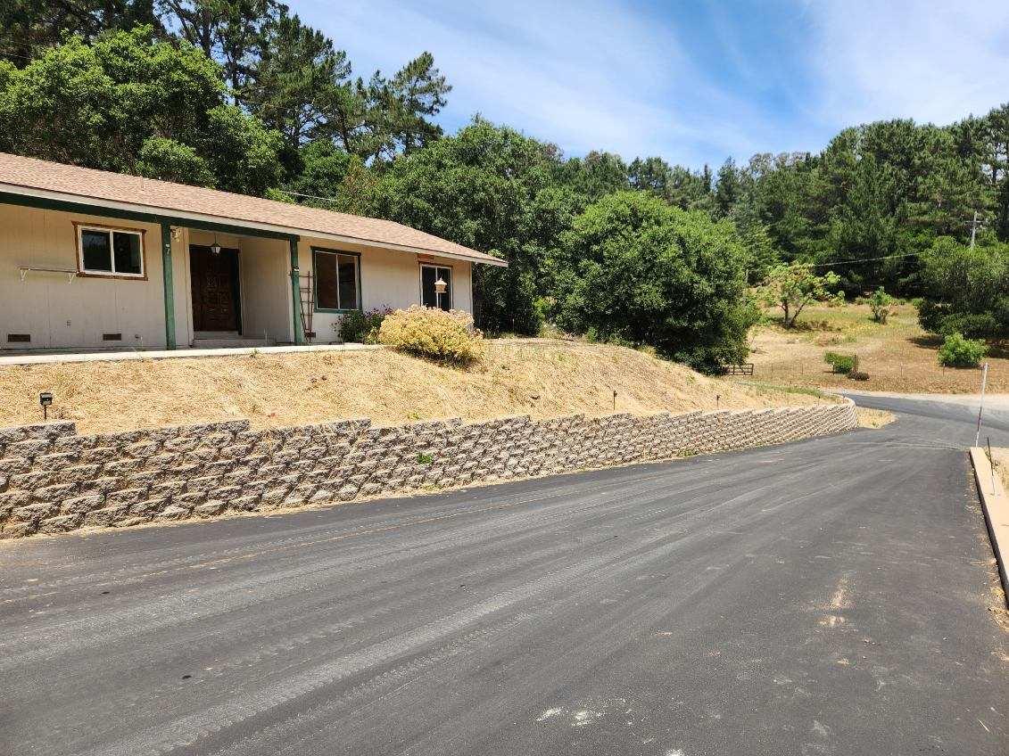 819 Lewis Road Watsonville, CA 95076 - Photo 11 of 32 a house with a wooden fence
