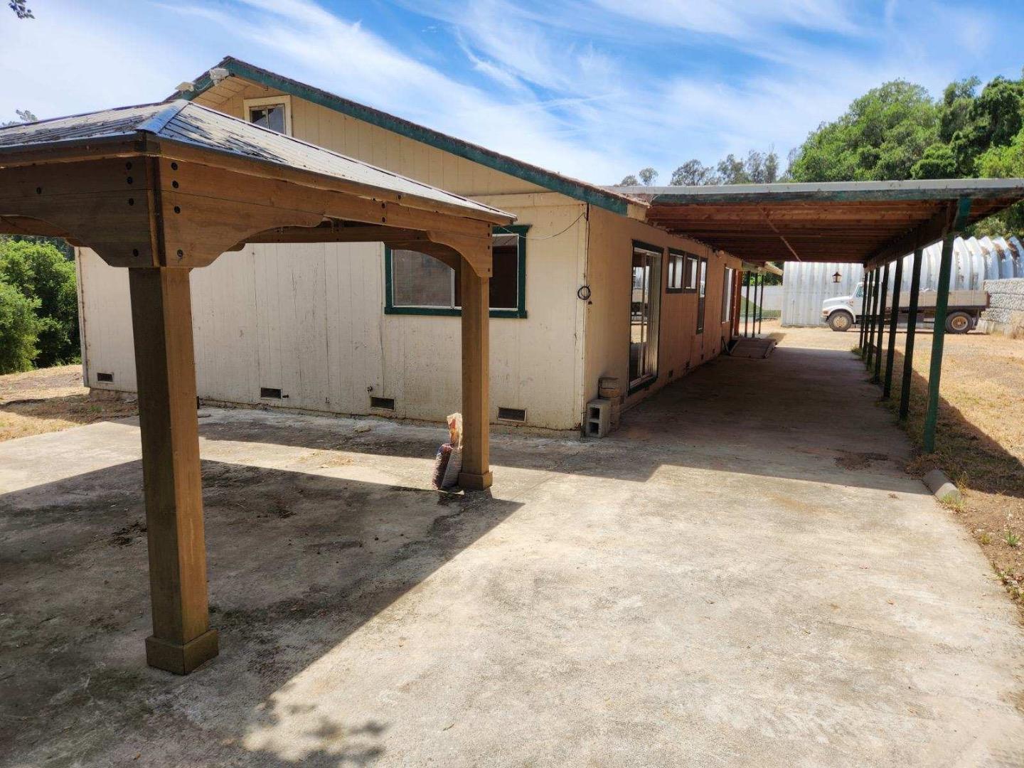 819 Lewis Road Watsonville, CA 95076 - Photo 12 of 32 a front view of a house with a yard