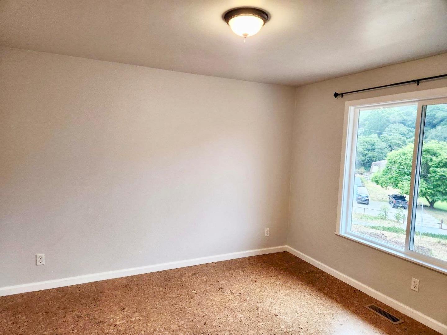 819 Lewis Road Watsonville, CA 95076 - Photo 23 of 32 an empty room with a window