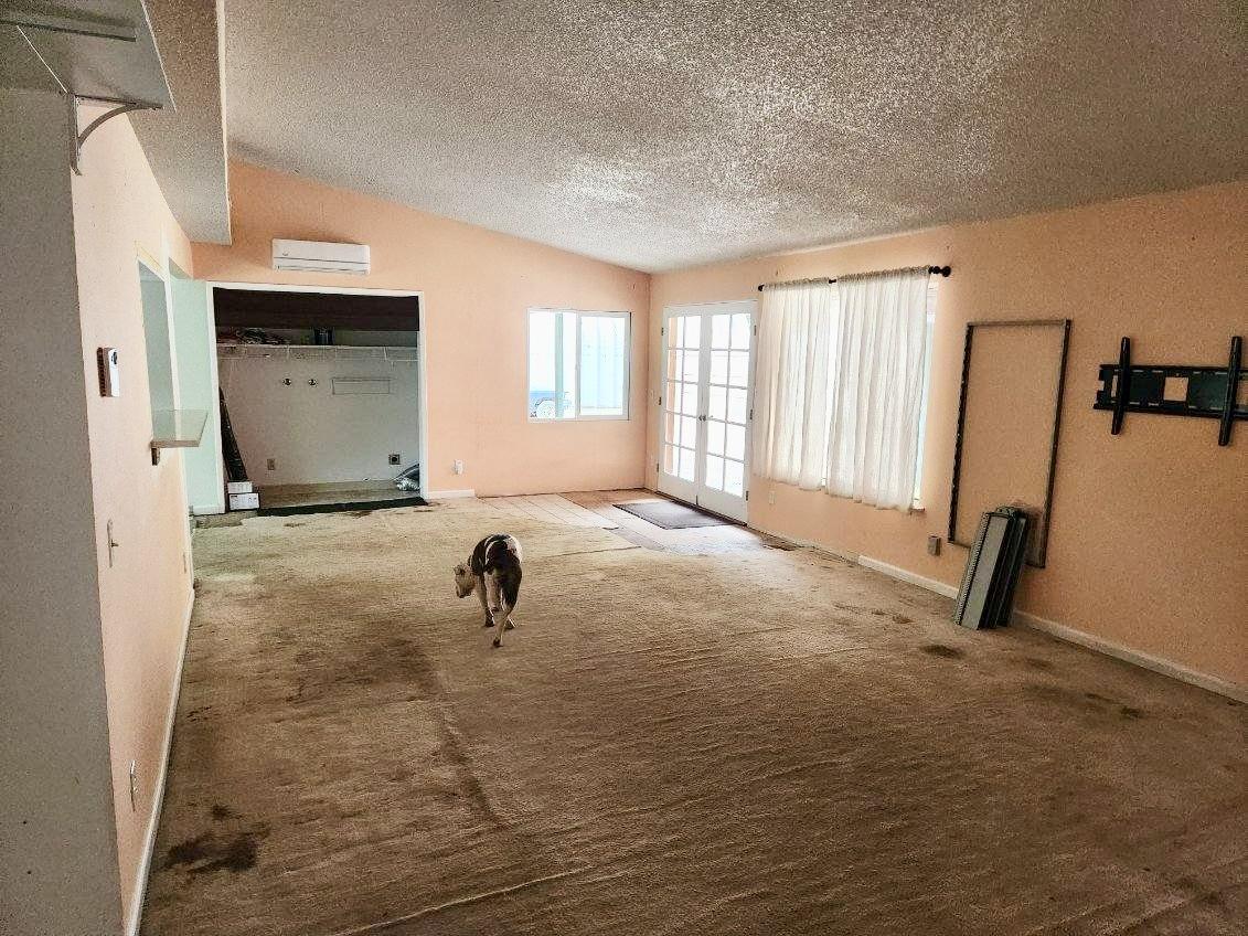 819 Lewis Road Watsonville, CA 95076 - Photo 29 of 32 a bedroom with furniture and a window