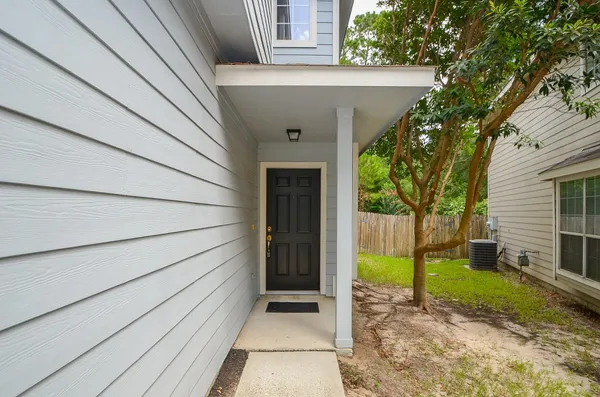 a view of house with outdoor space