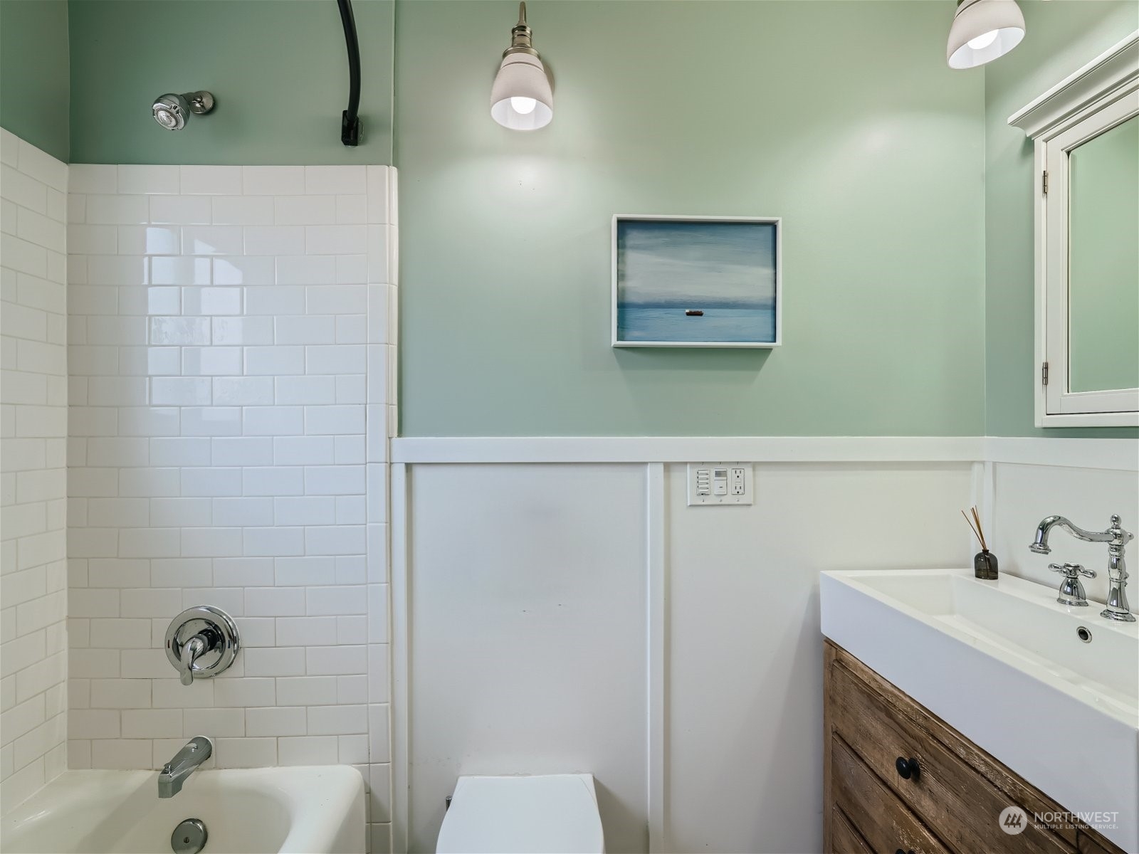 3032 Walnut Avenue Southwest Seattle, WA 98116 - Photo 14 of 29 a bathroom with a sink a toilet and shower