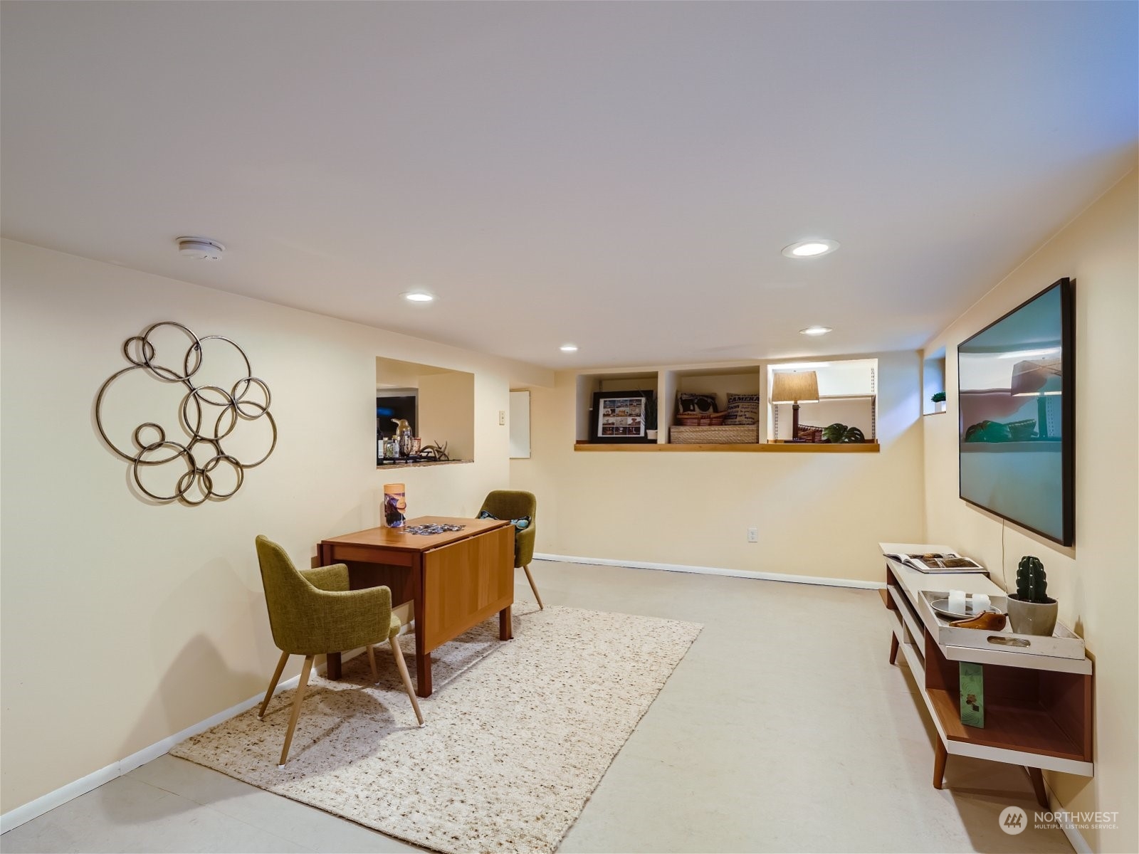 3032 Walnut Avenue Southwest Seattle, WA 98116 - Photo 19 of 29 a living room with furniture and a flat screen tv