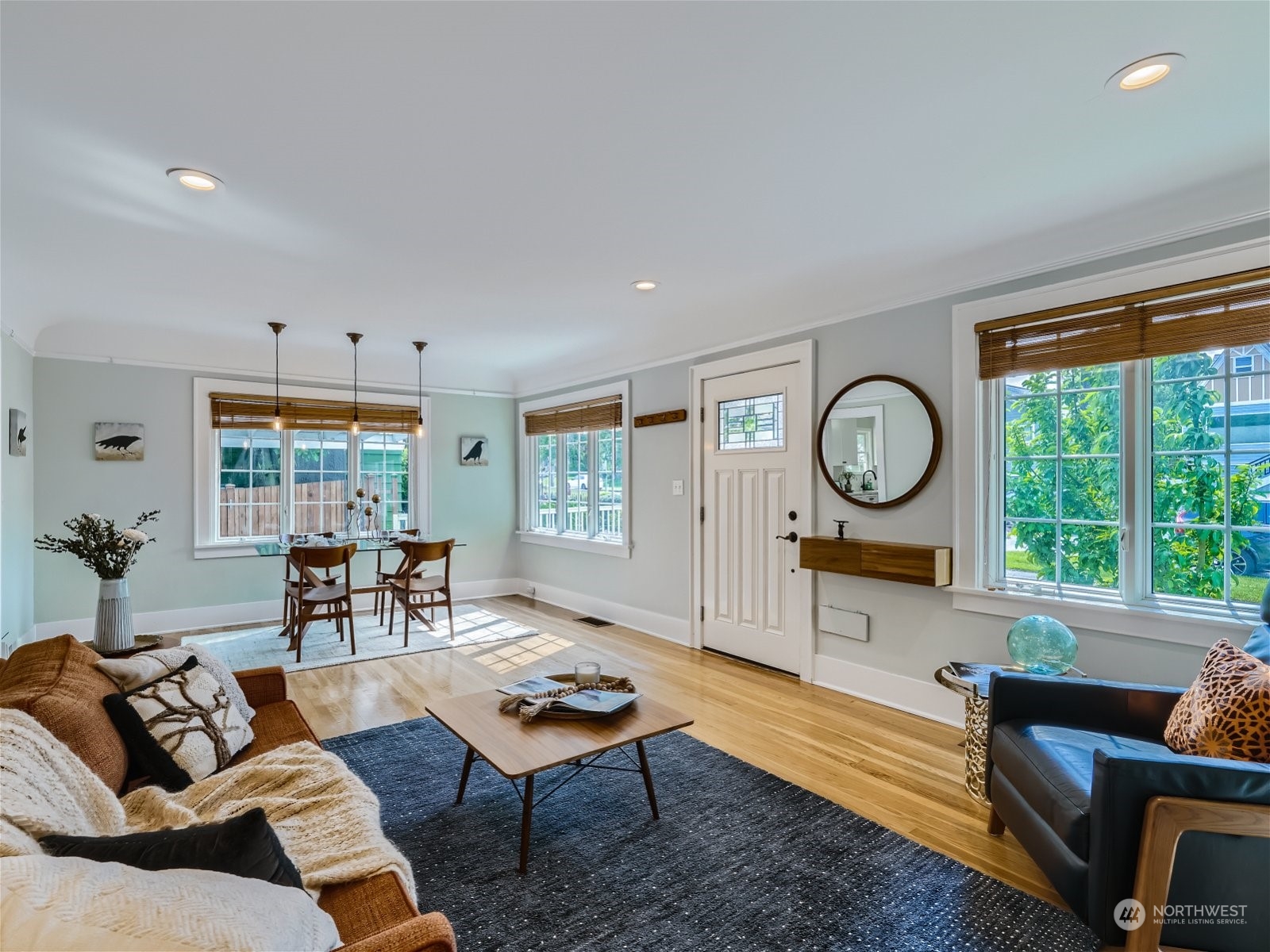 3032 Walnut Avenue Southwest Seattle, WA 98116 - Photo 2 of 29 a living room with furniture kitchen view and a large window