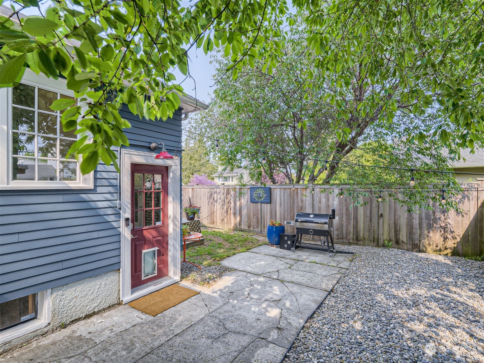 3032 Walnut Avenue Southwest Seattle, WA 98116 - Photo 24 of 29 a view of a backyard with furniture