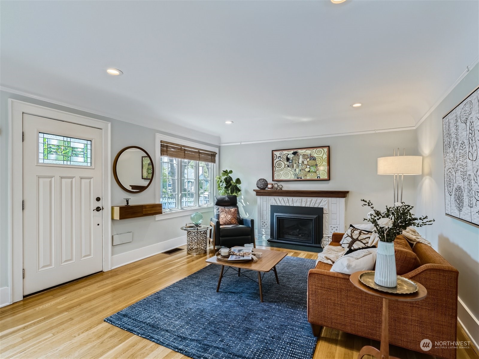 3032 Walnut Avenue Southwest Seattle, WA 98116 - Photo 3 of 29 a living room with furniture and a fireplace