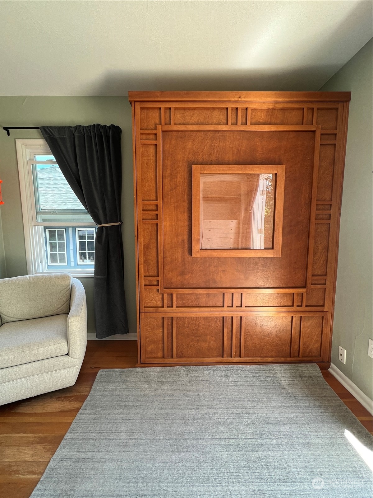 3032 Walnut Avenue Southwest Seattle, WA 98116 - Photo 10 of 29 a living room with a couch and dresser