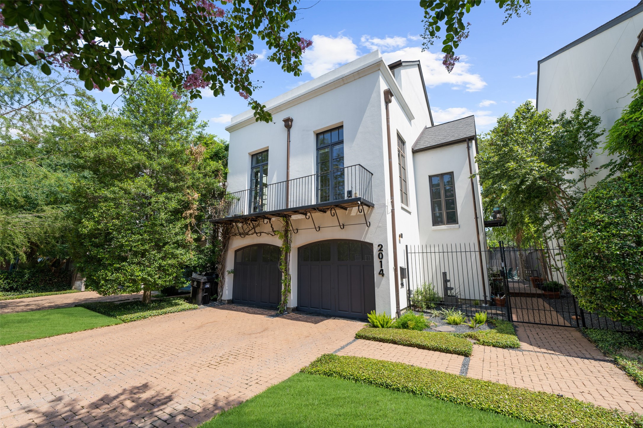 2014 Decatur Street Houston, TX 77007 - Photo 1 of 41 a front view of a house with a garden and yard