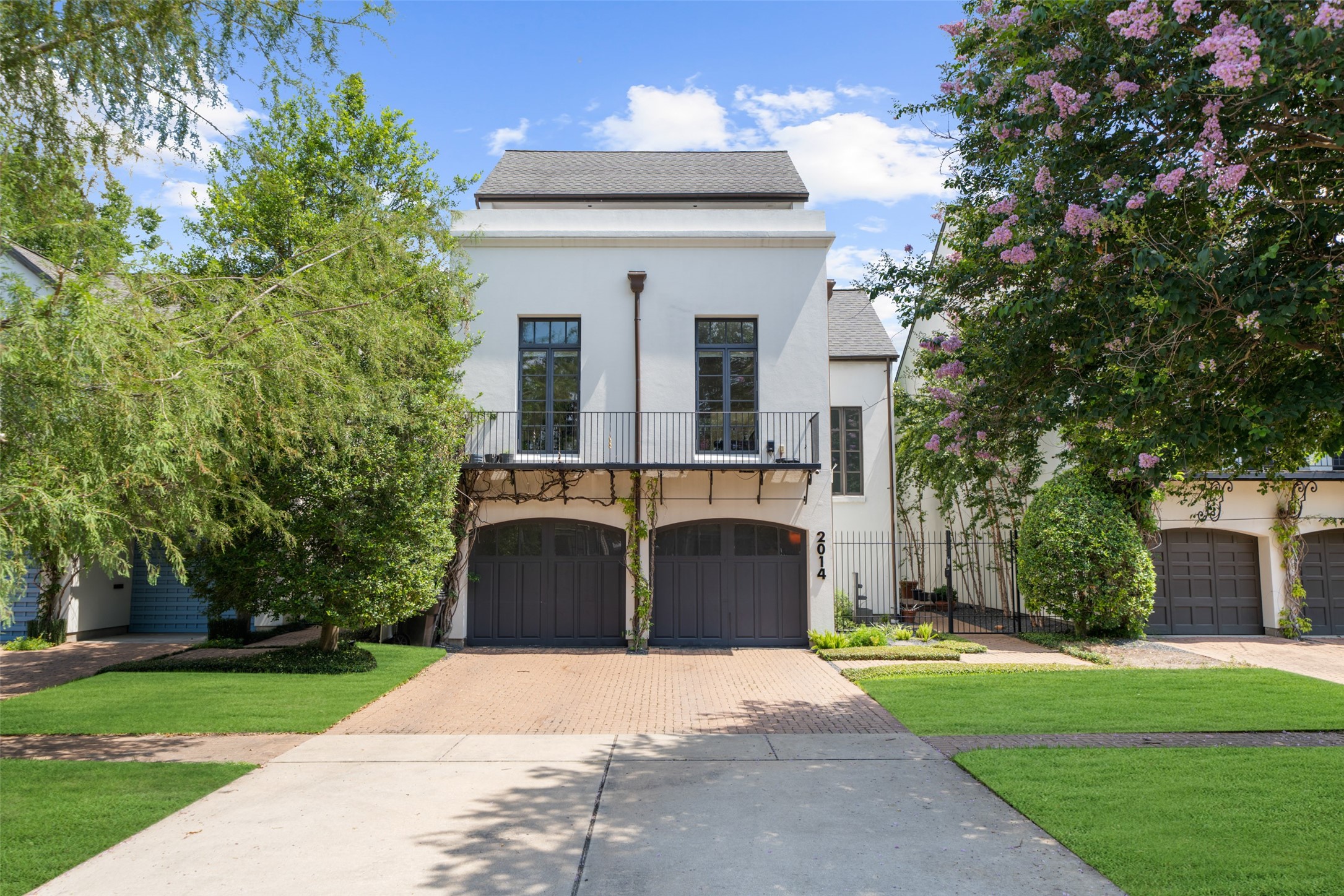 2014 Decatur Street Houston, TX 77007 - Photo 2 of 41 a front view of a house with a garden and tree