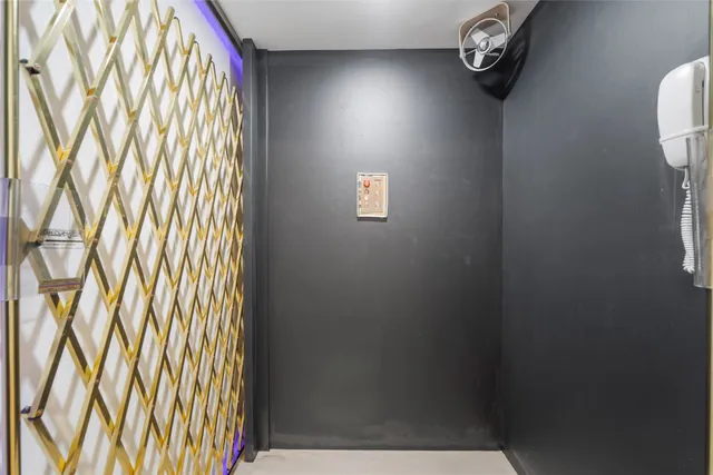 a view of staircase with wooden floor